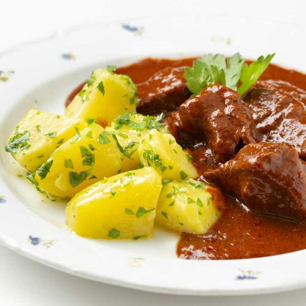 Beef gulyas with salted potatoes large