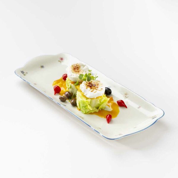 Karamellisierter Ziegenkäse mit Herzsalat und Mangovinaigrette