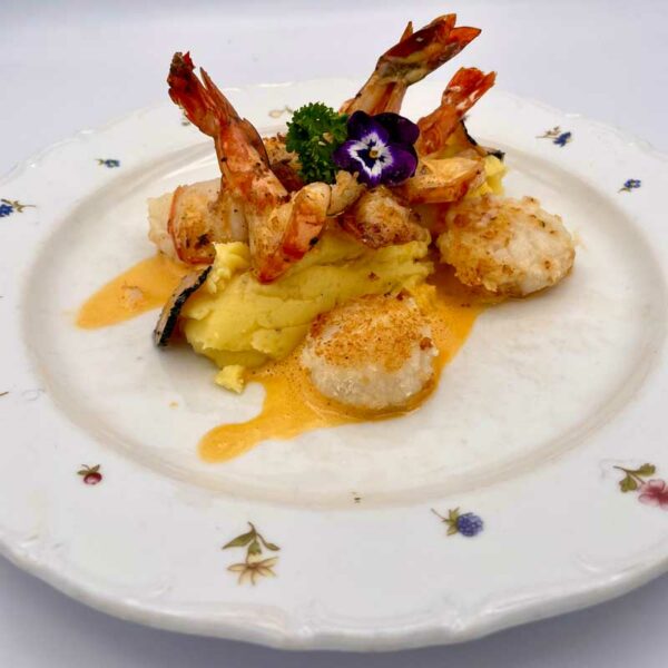 Fried prawns with greaves risotto and chanterelles